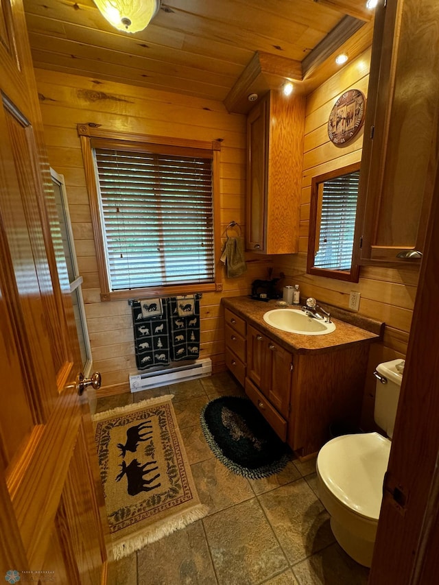 bathroom with a wealth of natural light, vanity, toilet, and wood ceiling