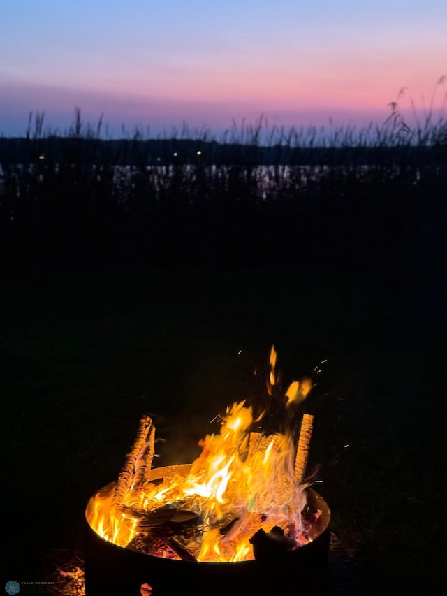 exterior space with a fire pit