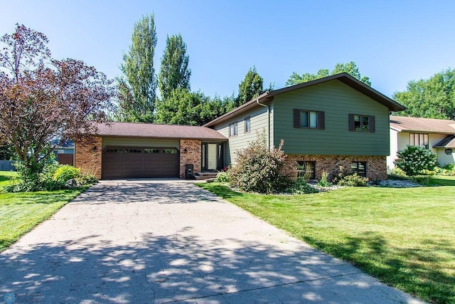 tri-level home with a garage and a front lawn