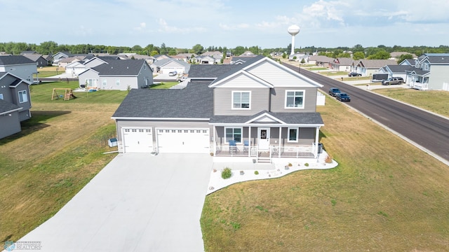 view of front of property featuring a front yard and a porch