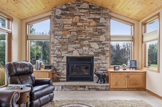 living room featuring a stone fireplace, vaulted ceiling, and wooden ceiling