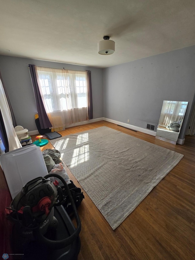 interior space with hardwood / wood-style flooring