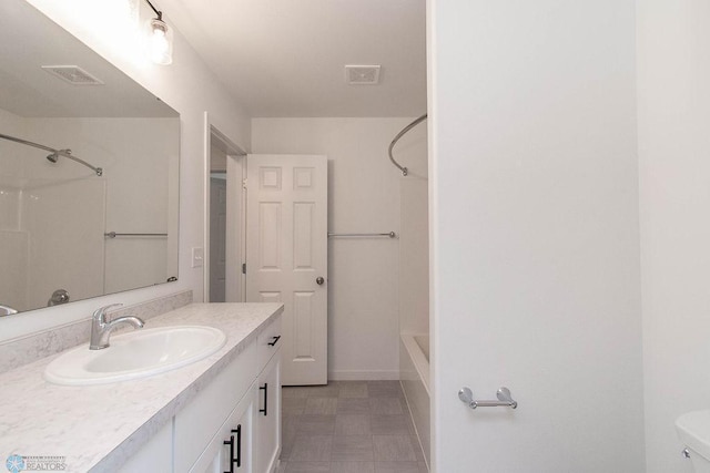 full bathroom featuring vanity, shower / washtub combination, and toilet