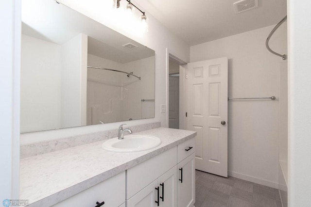 bathroom with shower / washtub combination and vanity