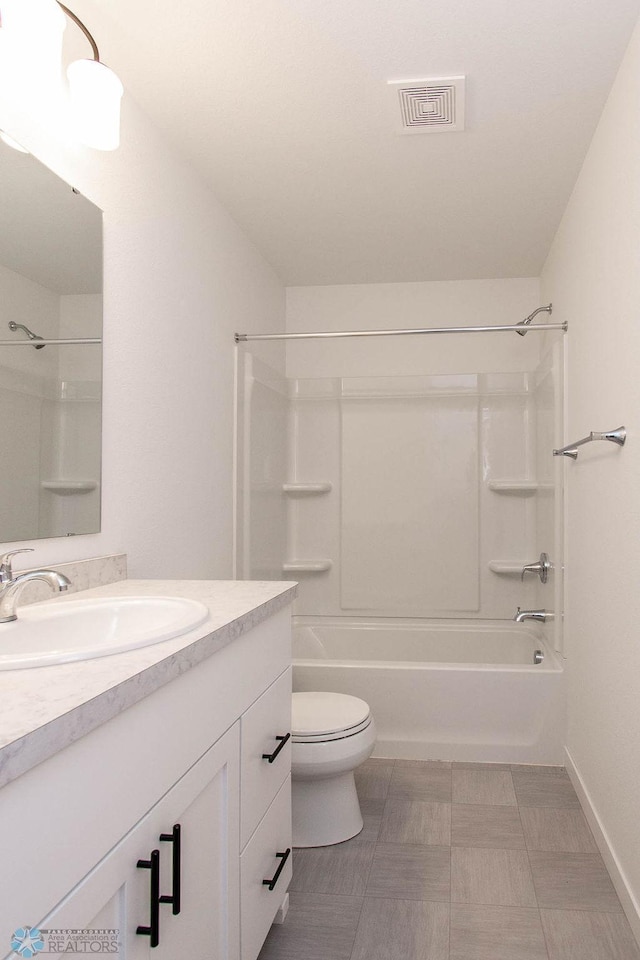 full bathroom featuring vanity, toilet, and bathing tub / shower combination