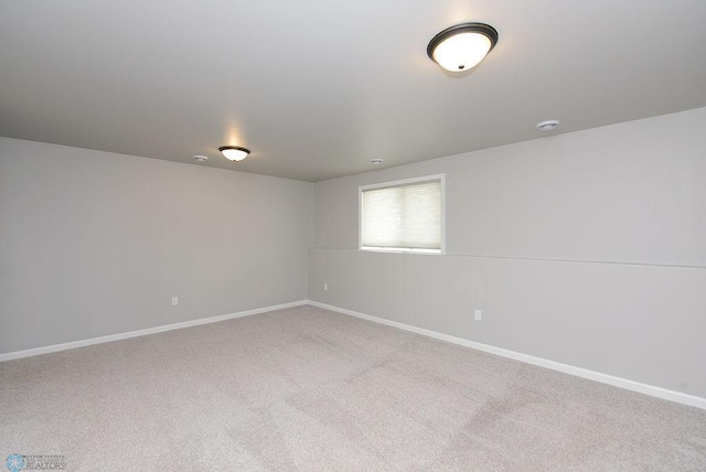 unfurnished room with carpet flooring