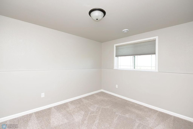 unfurnished room featuring carpet floors