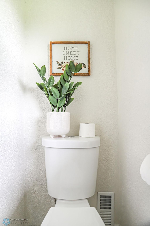 bathroom featuring toilet