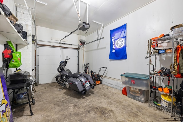 garage featuring a garage door opener