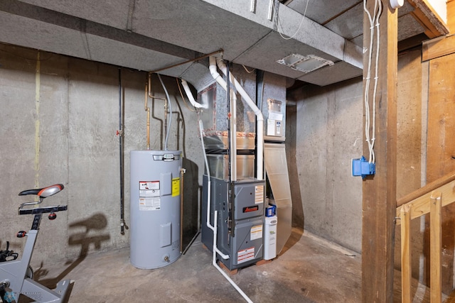 utility room featuring water heater