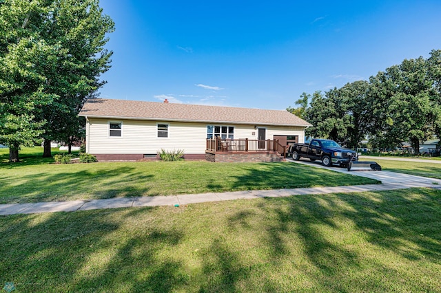 ranch-style home with a wooden deck and a front lawn