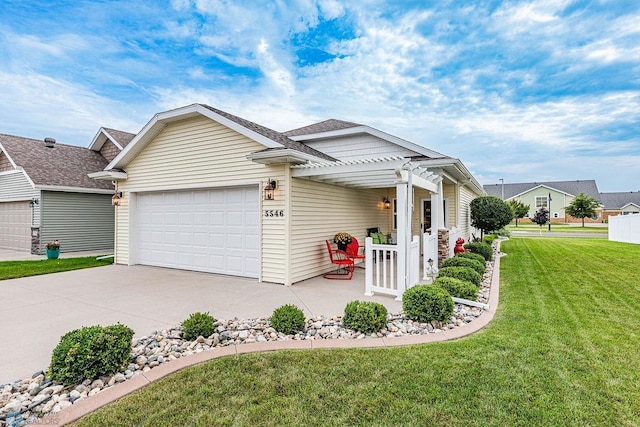 view of front facade featuring covered porch, a front yard, and a garage