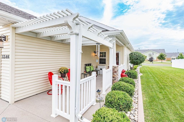 exterior space with a pergola, a front yard, and a porch