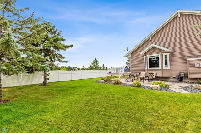 view of yard with a patio area