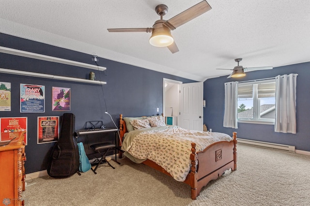 carpeted bedroom with a textured ceiling, baseboard heating, and ceiling fan