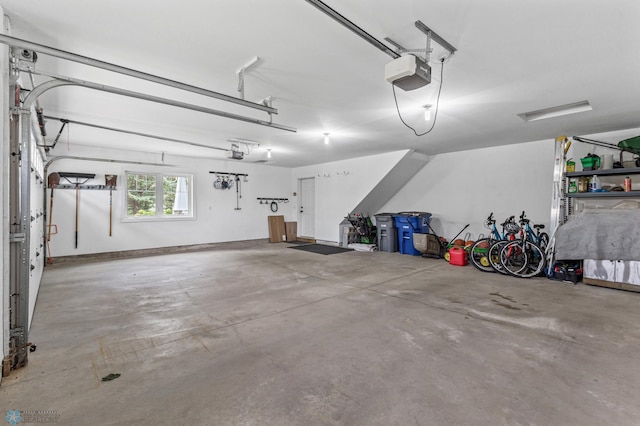 garage featuring a garage door opener