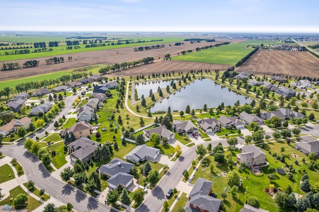 drone / aerial view with a rural view and a water view