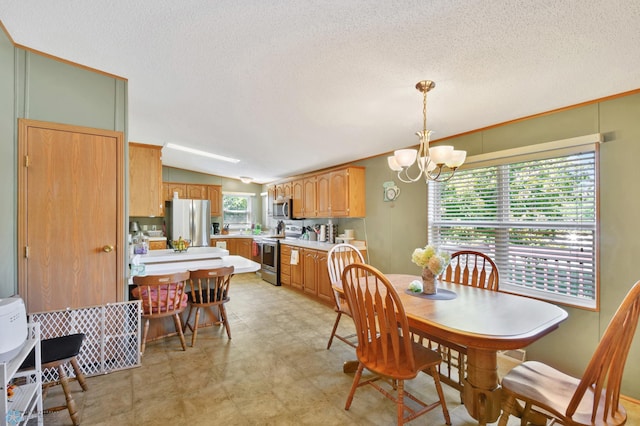 dining room with lofted ceiling, a notable chandelier, and a textured ceiling