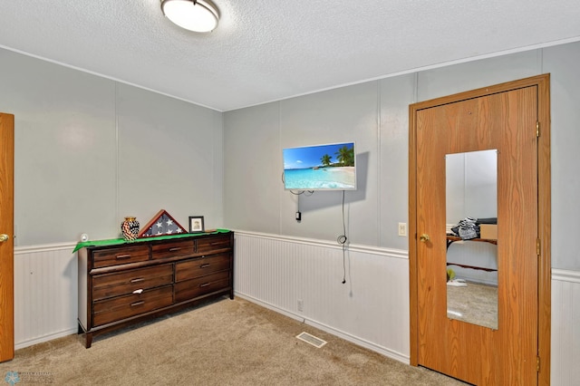 interior space featuring a textured ceiling