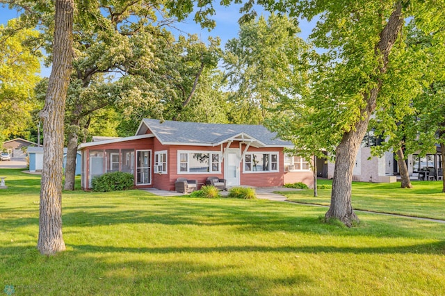 view of front of property with a front lawn