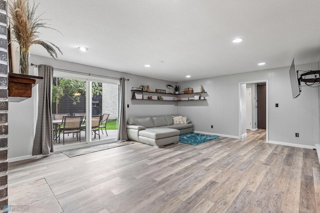 unfurnished living room featuring light hardwood / wood-style floors