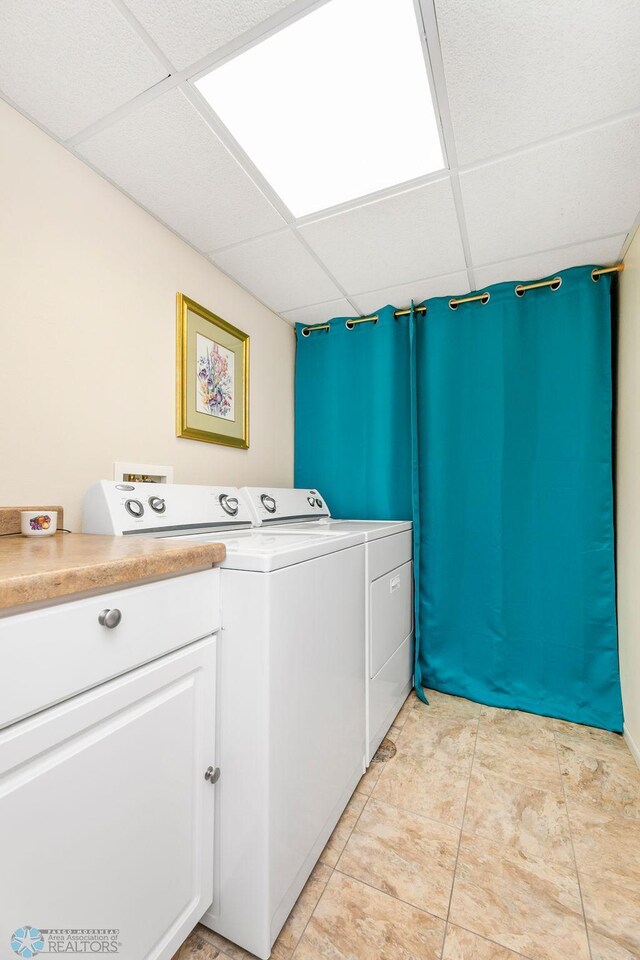 laundry area with washing machine and dryer