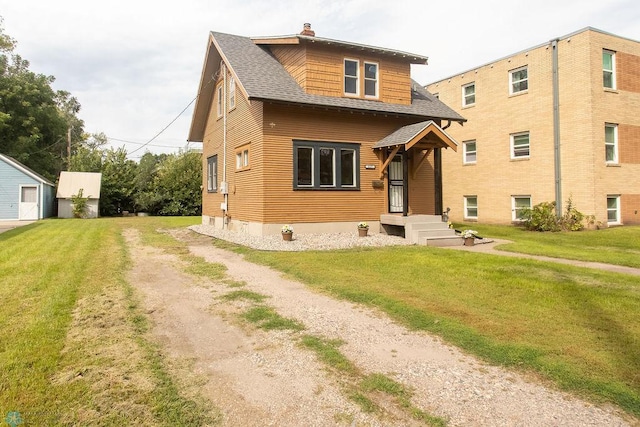 view of front of home with a front lawn