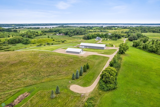 aerial view featuring a rural view and a water view