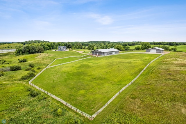 birds eye view of property with a rural view