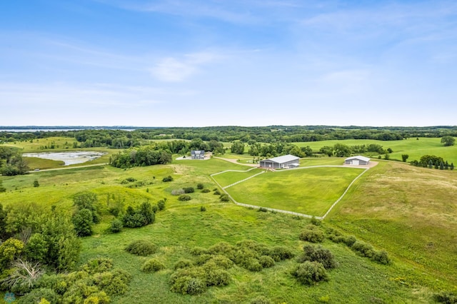 drone / aerial view with a rural view and a water view