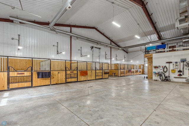 interior space featuring wooden walls