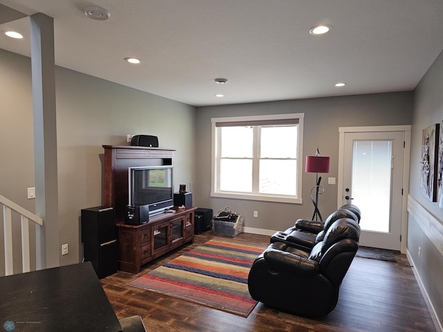 living room featuring dark hardwood / wood-style flooring