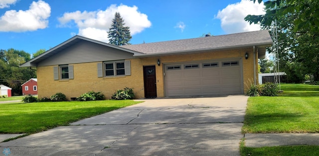 ranch-style house with a front lawn and a garage