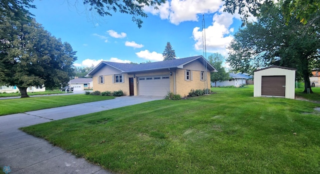 view of front facade featuring a garage, an outdoor structure, and a front yard