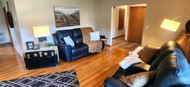 living room with hardwood / wood-style flooring