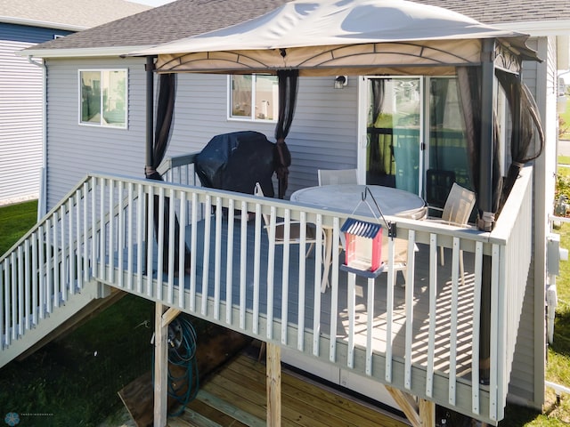 wooden deck with a gazebo