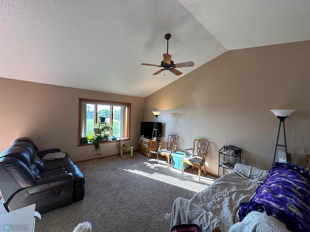 carpeted living room featuring lofted ceiling, ceiling fan, and a textured ceiling