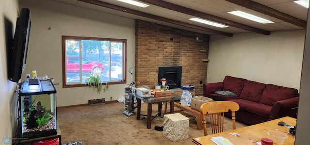 living room with carpet flooring, lofted ceiling with beams, and a brick fireplace