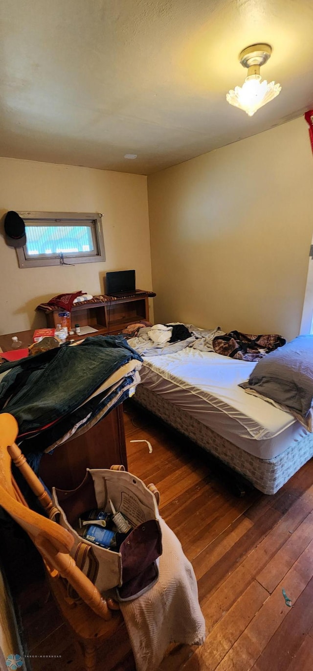 bedroom featuring hardwood / wood-style floors