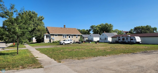 view of front of home with a front yard