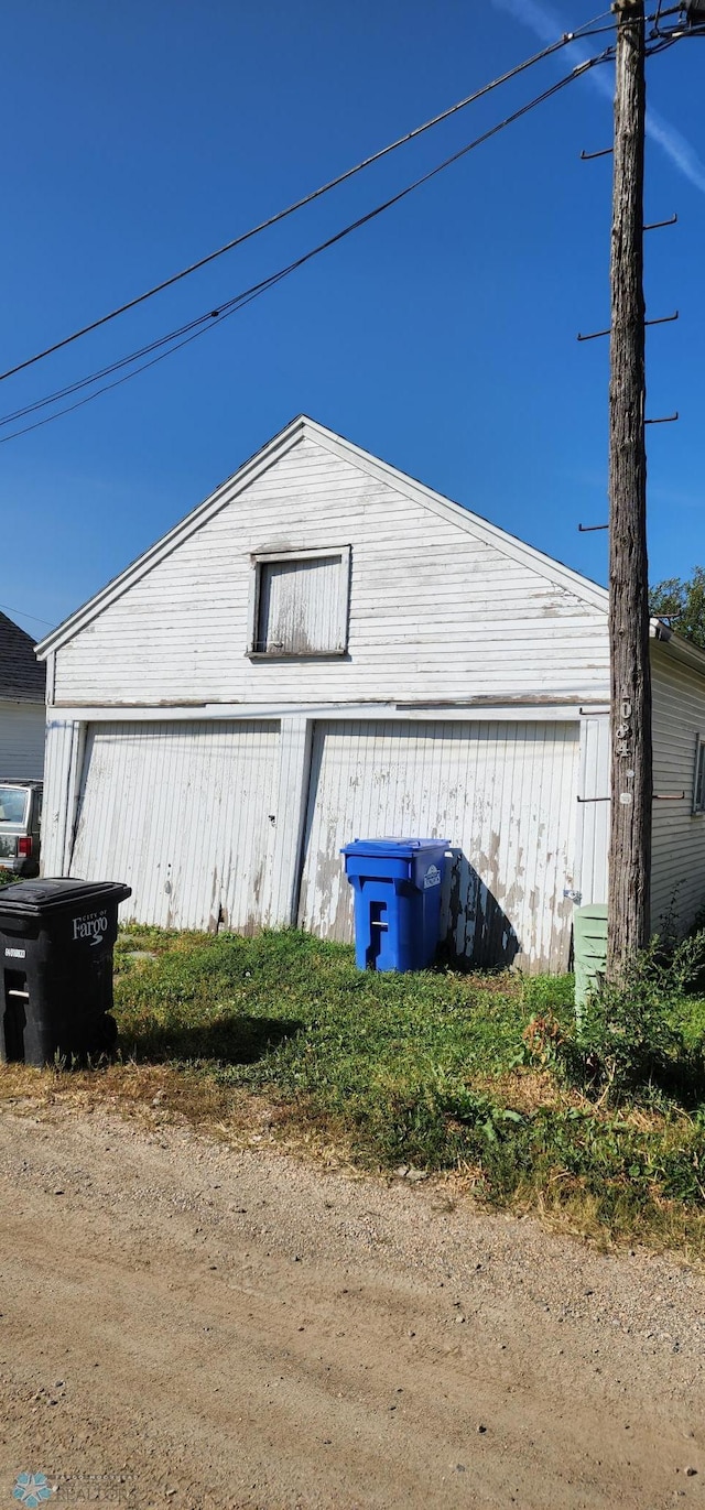 view of outdoor structure featuring a garage