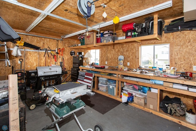 garage featuring a workshop area