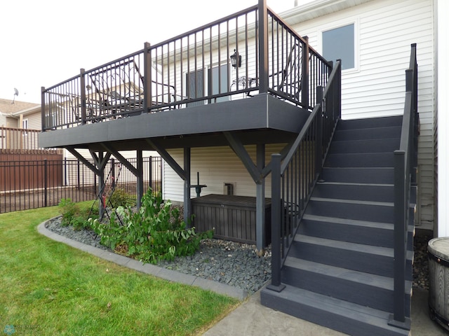 entrance to property with a deck