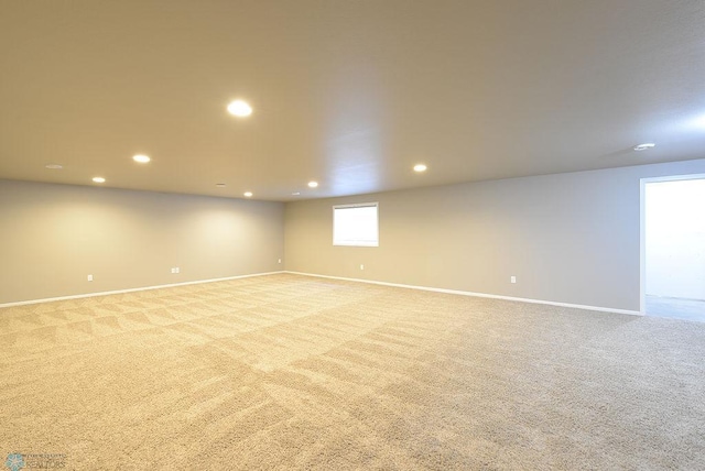 spare room with light carpet