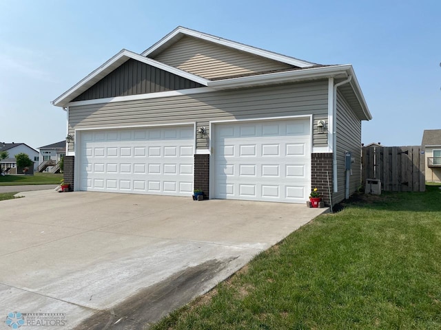 exterior space with a garage and a front yard