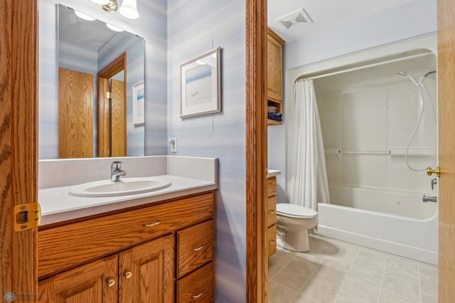 full bathroom featuring vanity, toilet, and shower / tub combo