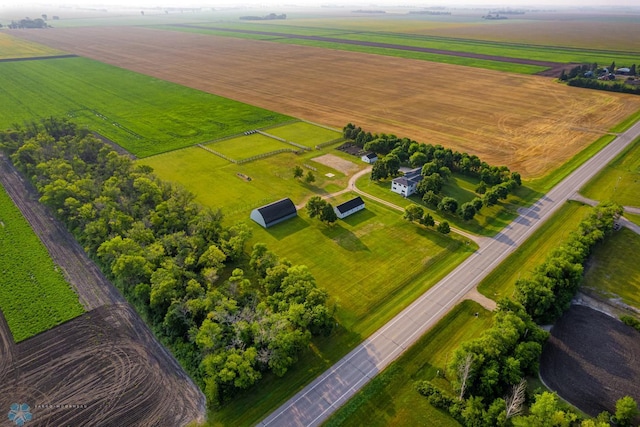 birds eye view of property with a rural view