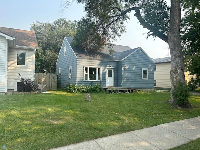 view of front of home with a front yard