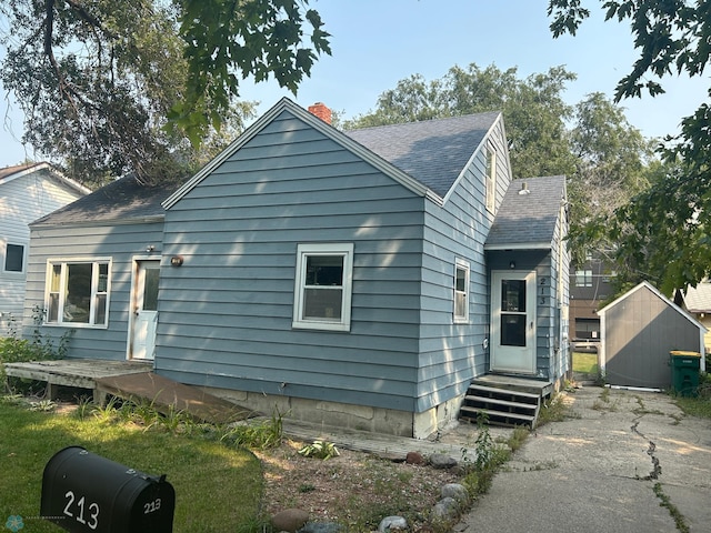 exterior space with a shed