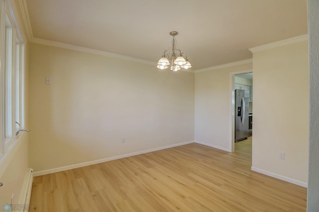 unfurnished room featuring a baseboard heating unit, light wood-type flooring, a chandelier, and ornamental molding